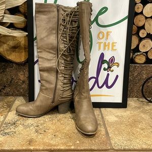 Women’s knee high boots.